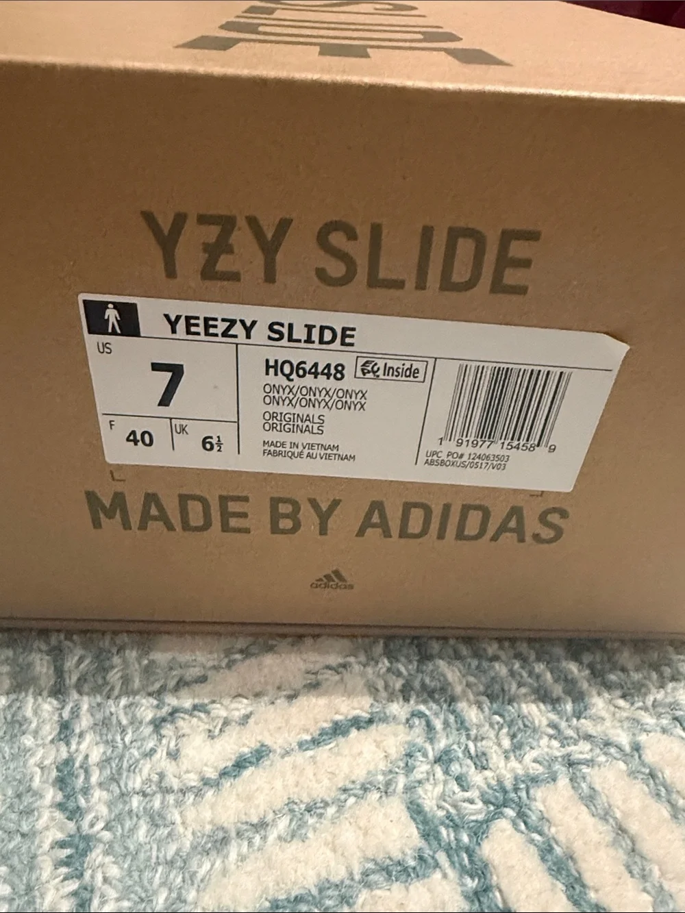 Yeezy slide by Adidas size 7 M or 8.5 w new in box